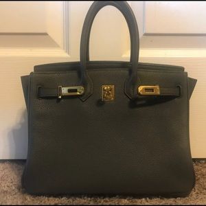 Grey leather handbag